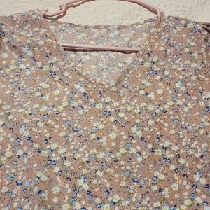 Pale pink with white, cream and blue flowers